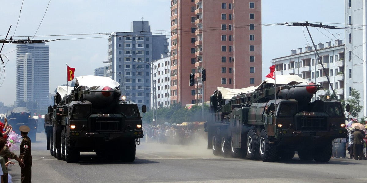 North Korean ballistic missiles being paraded on the back of military trucks