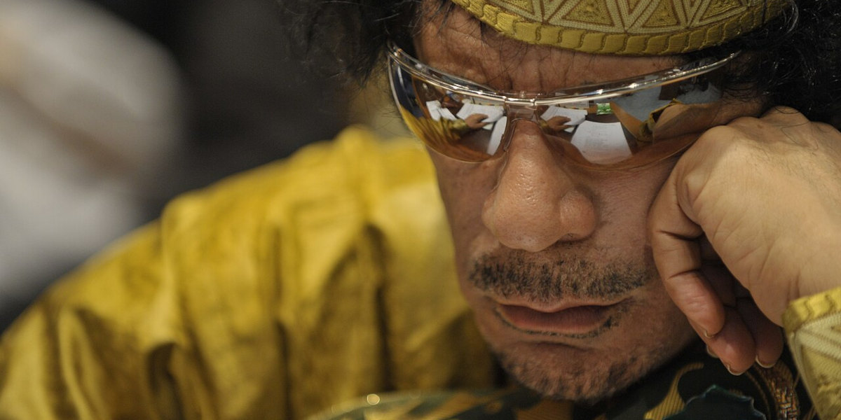 A close up photograph of former Libyan President Muamar Gaddafi