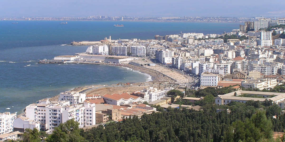 A photograph of Algiers, Algeria showing the cityscape and the coast