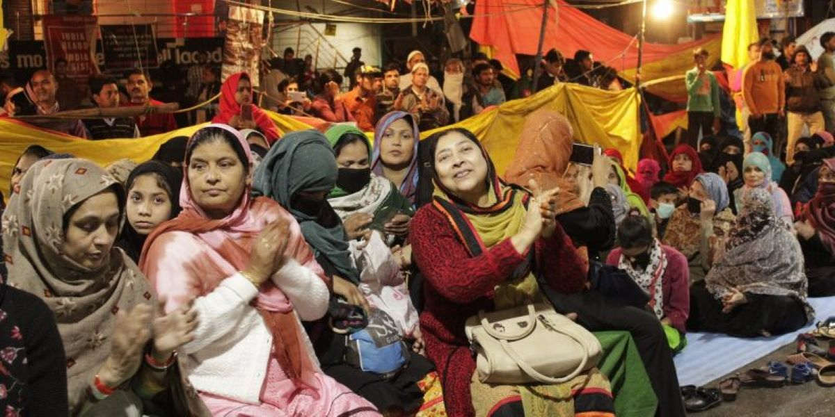 Muslim women protestors sat together at Shaheen Bagh protest camp in March 2020