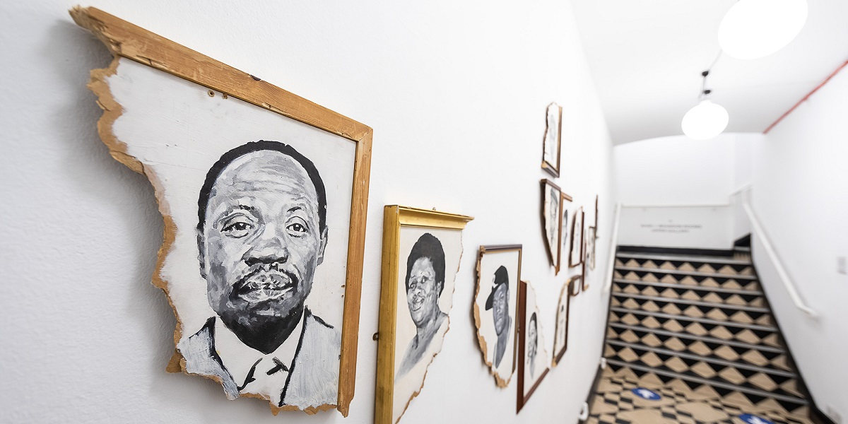 A section of the exhibition showing an arrangement of monochrome portraits