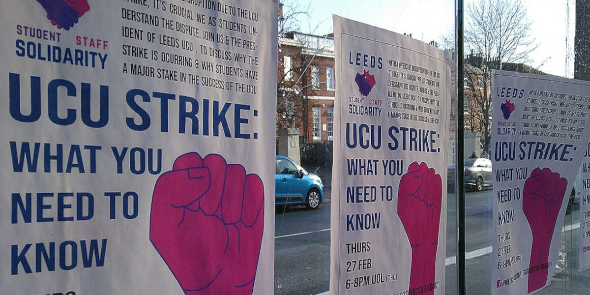 UCU strike posters show a raised pink fist