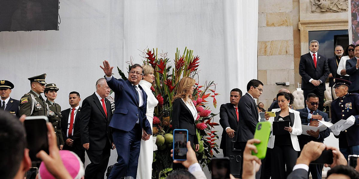 President of Colombia Gustavo Petro waving to his supporters during his inauguration