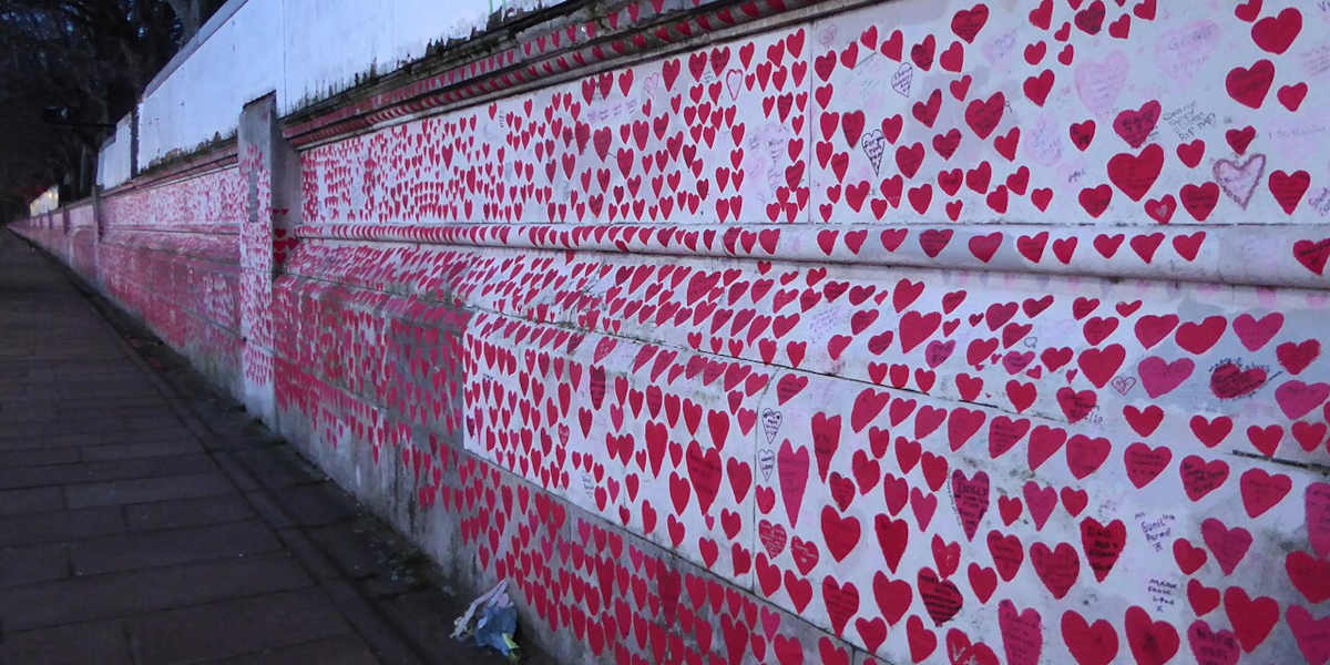 A photo The National Covid Memorial Wall in London, showing hundreds of painted hearts to commemorate victims of the COVID-19 pandemic