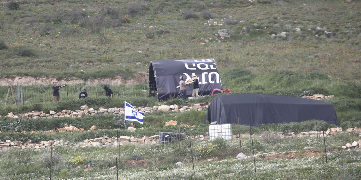 Zionist colonisers install a shepherding outpost and Israeli flags to seize Palestinian land outside Nablus